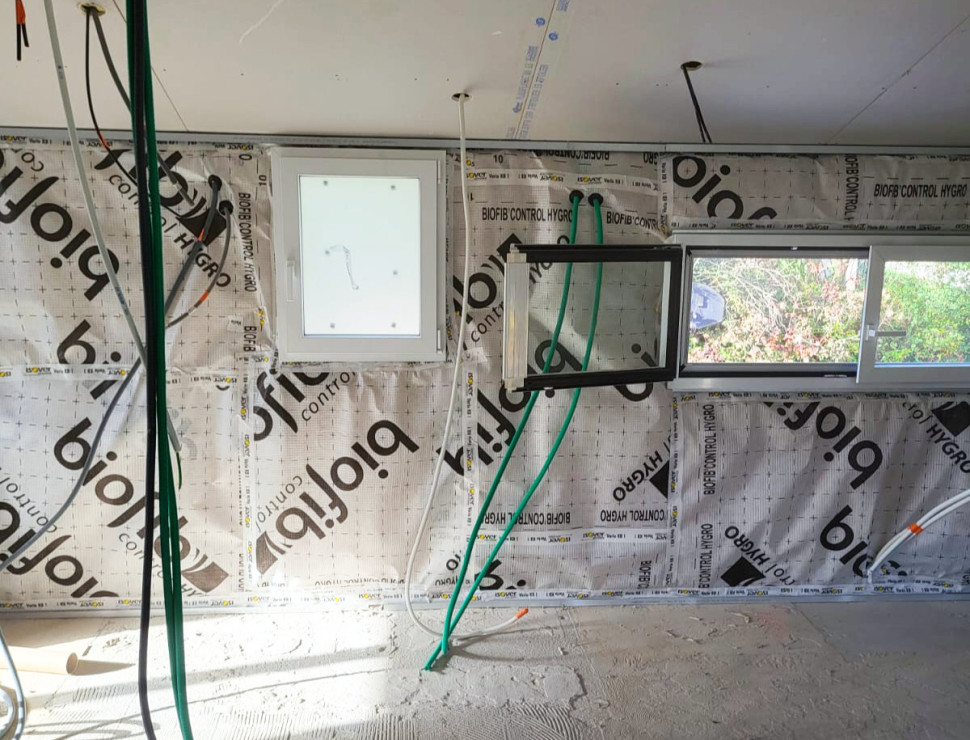 Isolation des murs d'une maison en isolant écologique « BIOFIB » - Renobast